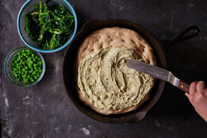 preparing-green-ricotta-skillet-pizza