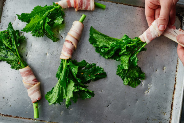 wrapping-bacon-around-broccoli-rabe